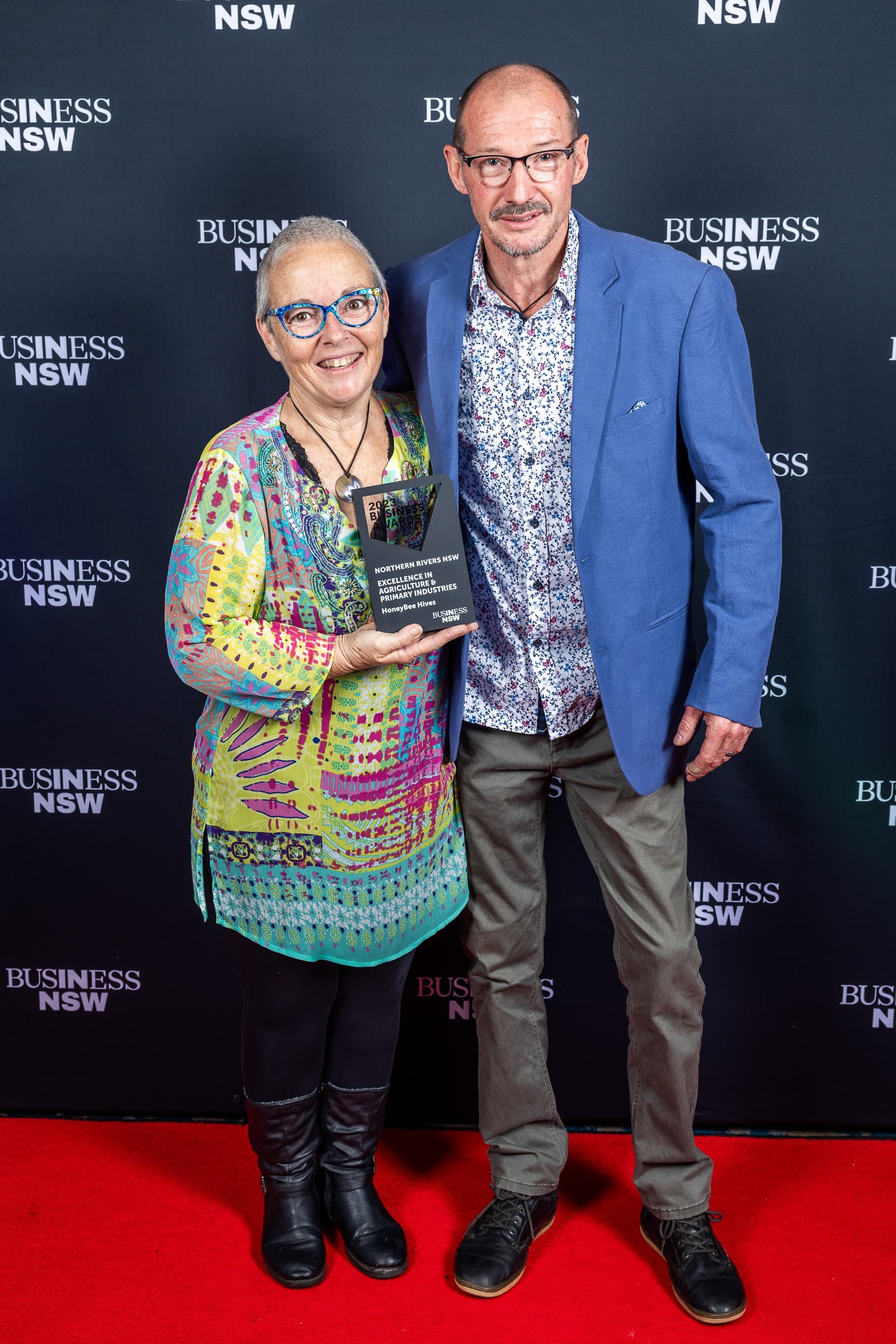 Di and Scott holding the 2023 Northern Rivers Business NSW Excellence in Agriculture and Primary Industries award